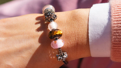Trollbeads bangle with strawberry quarts, and a Cherub of Love Beaddaysi bead small round moonstone and 
