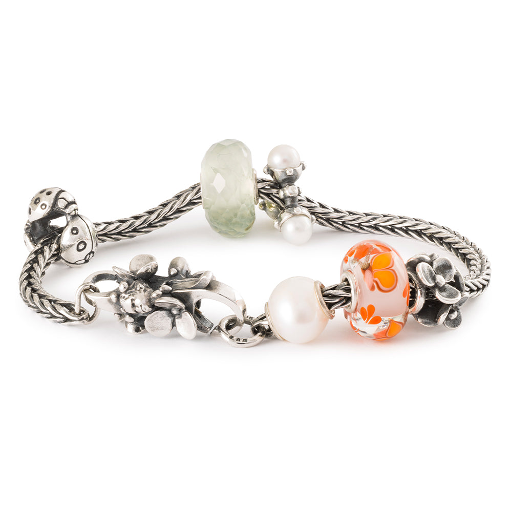 Trollbeads limitierte Auflage Blumenfee Armband Frühling 2024 mit zusätzlichen Beads und einer Perle