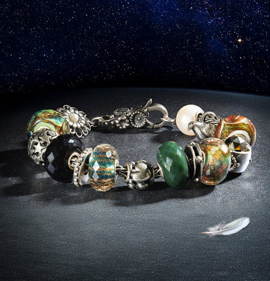 Full winter bracelet with Guardian Wings collection beads. Mix of silver and glass