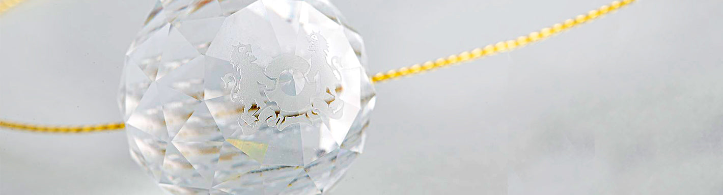 Sonnenfänger aus Glas mit eingraviertem Trollbeads Logo