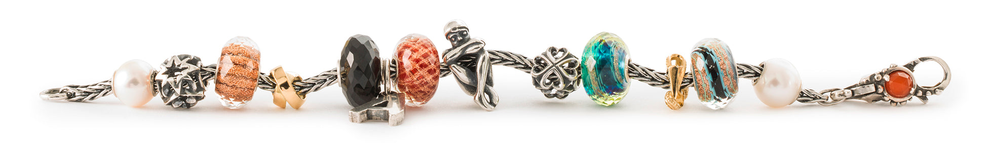 Trollbeads Fuchsschwanz-Armband mit Beads aus Perlmutt, Glas, Silber und Edelstein, die das Gefühl der Zusammengehörigkeit symbolisieren.